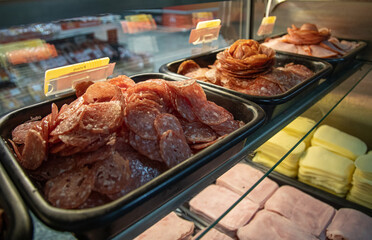 salami in the showcase at the market