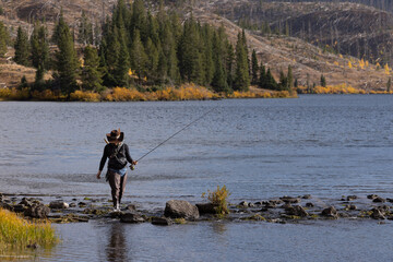 Cowgirl FLy Fishing in Colorado Mountain WIlderness