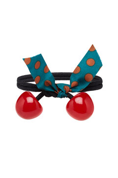 Close-up shot of a black hair tie decorated with a red cherries and a green bow. Women's fashionable cherry hair band is isolated on a white background. Front view.