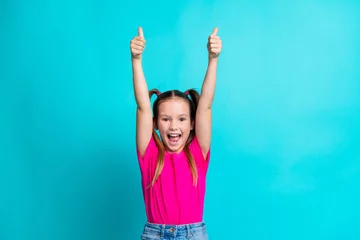  Photo of glad crazy cute girl wear trendy clothes scream yes cool offer product sale discount thumb up isolated on cyan color background © deagreez