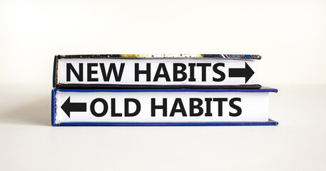 New or old habits symbol. Concept word New habits Old habits on beautiful books. Beautiful white table white background. Business new or old habits concept. Copy space.