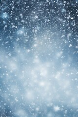 Obraz premium A blue background with snow flakes and stars. Perfect for winter-themed designs