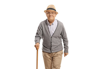 Elderly gentleman with a cane walking and smiling