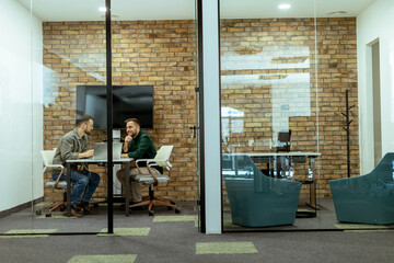 Casual Business Meeting in a Modern Office Lounge