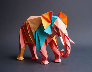 Origami elephant made of colored paper. Three-dimensional figurine