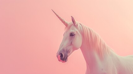 A mythical white unicorn stands gracefully against a soft pink backdrop, creating a surreal and enchanting scene.