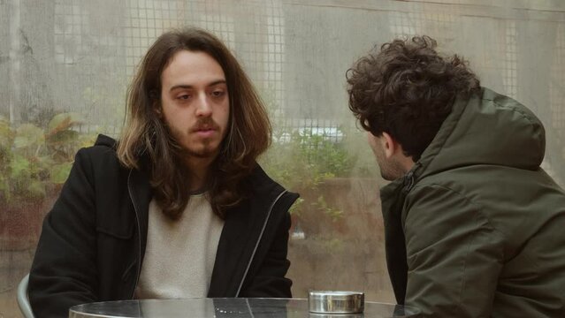 Emotional Connection: Two Friends Share Tender Moment with Hug