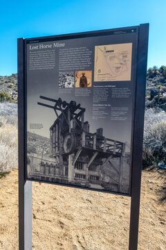 Joshua Tree, California, USA - February 11, 2024:  Lost Horse Mine Loop Hiking Trail Sign Table with Map, Image and Historic Text Information