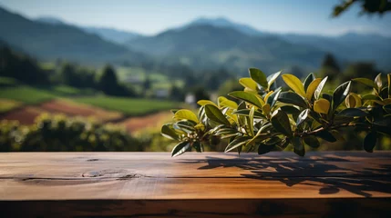 Fototapete Wooden floor with blurred beautiful landscape of tea plantation background. © alexkich