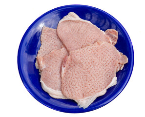Background of a plate of tenderized pork. The tenderloins are hammered or heavy pounded to make it flatter or thinner. Easier to cook. Good concept for meat preps or designing ideas for food sale. 