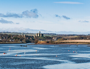 Obraz premium River Coquet estuary with Warkworth Castle and copy space