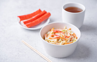 Japanese kani salad with fresh vegetables and crab sticks