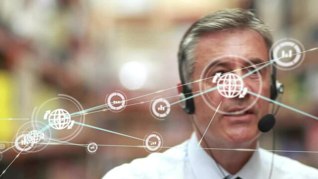 Animation of network of connections over caucasian male worker giving directions in warehouse