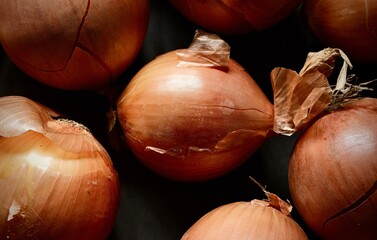 Colorful, ripe onions. Still life photography.