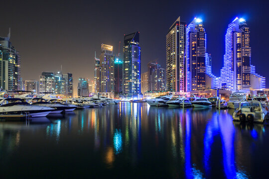 Dubai, UAE - March 31, 2014: Modern skyscrapers of Dubai Marina at night, United Arab Emirates.