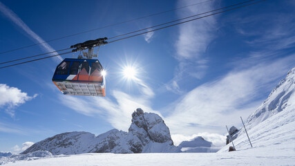 Breathtaking Snowy Landscape with Colorful Cable Car in Mid-Air