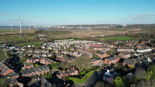 Aerial shot of the cityscape of Frodsham on a sunny day in the county of Cheshire, England, UK