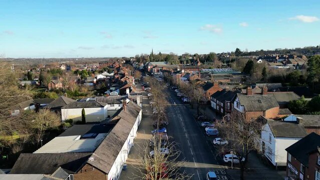 Drone shot of the Main Street in Frodsham town on a sunny day in the county of Cheshire, England, UK