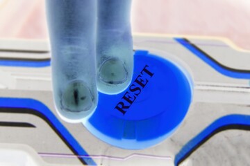 Blue glowing initiation start button with the text word RESET