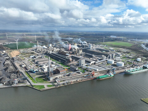 Fertilizer industry, production, smoke stacks at Sluiskil, Zeeland, The Netherlands. Aerial birds eye view. Heavy industry.
