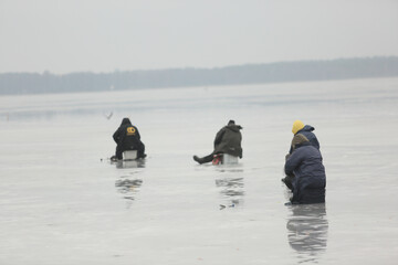 Fishermen enjoying a days fishing on the ice