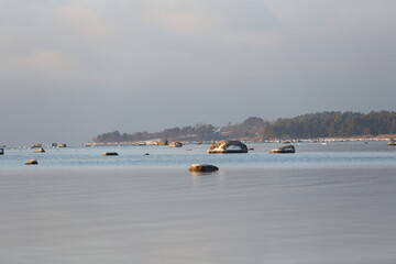 Winter Landscape. Rocks in the sea with snow