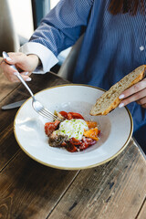 Appetizing brunch, salad with cheese. Restaurant food service, food photography.