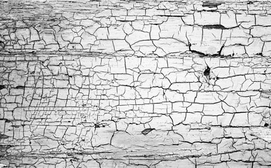 Dark gray surface with cracks, authentic texture background. Cracked grunge surface