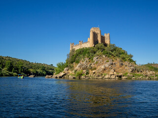 Fototapeta na wymiar Almorol Castle atop the rock island in the middle of Tagus River
