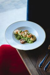 Italian pasta with parmesan and shrimp. Beautiful presentation of food.
