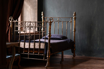old retro bed by the window