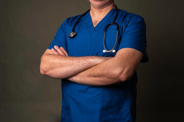 doctor with blue clothing in a hospital