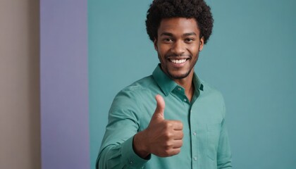 A confident man with curly hair gives a thumbs up in a teal green shirt. - obrazy, fototapety, plakaty