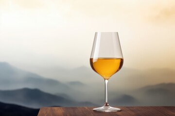 Savor tranquility with a glass of rich amber wine against a backdrop of misty mountain layers. Misty Mountain Wine Retreat