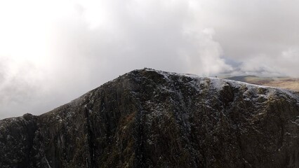 Fototapeta premium The snow covered mountains of Cadair Idris in Eryri National Park, Wales