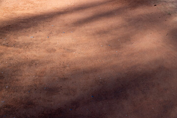 a walking red path made of rammed sand after sweeping - obrazy, fototapety, plakaty