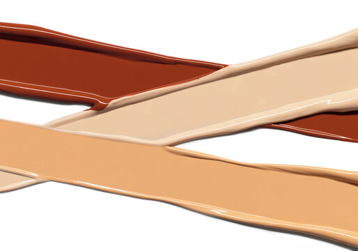 Makeup Liquid foundation smears overlapping composition isolated on white background. BB CC Cream Concealer texture. Cosmetic product brush swatch