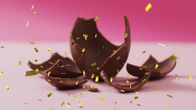 Animation of confetti falling over chocolate on pink background