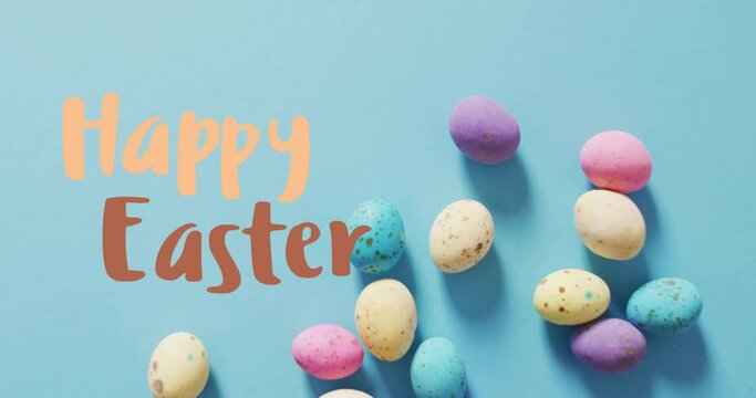 Animation of happy easter text over easter eggs