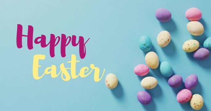 Animation of happy easter text over easter eggs