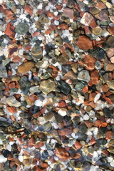 pebble through clear water