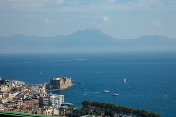 Fototapeta premium Naples, Italy The famous city of the italian south with Largo Maradona, Plebiscito Square, the gallery, Quartieri Spagnoli Spaccanapoli Vomero and the lagoon. Murales all over the town