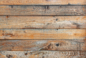 Horizontally oriented board texture made of wooden planks.