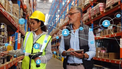 Animation of network of connections with icons over diverse female and male workers in warehouse - Powered by Adobe