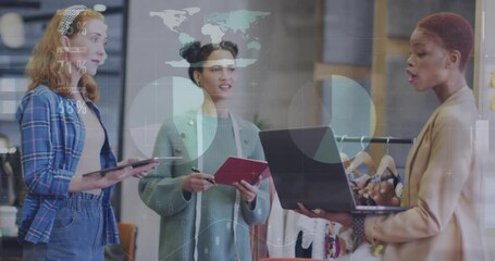 Animation of financial data processing over diverse female fashion designers in office - Powered by Adobe