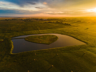 Fototapeta premium aerial vew of the geen field stack