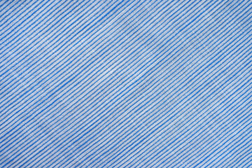Natural linen texture as background, blue cotton fabric with diagonal line striped pattern, texture...