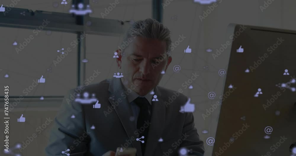 Poster animation of network of connections with icons over caucasian businessman using computer