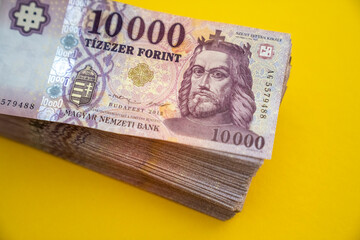 Hungarian large-denomination banknotes, (forint) paper money, HUF 10,000 banknotes spread out on a...