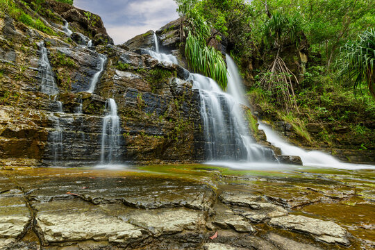 A low perspective of the upper Tarzan Falls on the tropical island of Guam, a US territory.